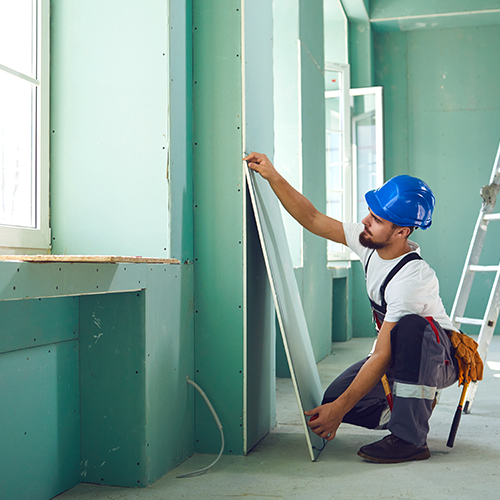 man working on a home remodeling nashua nh